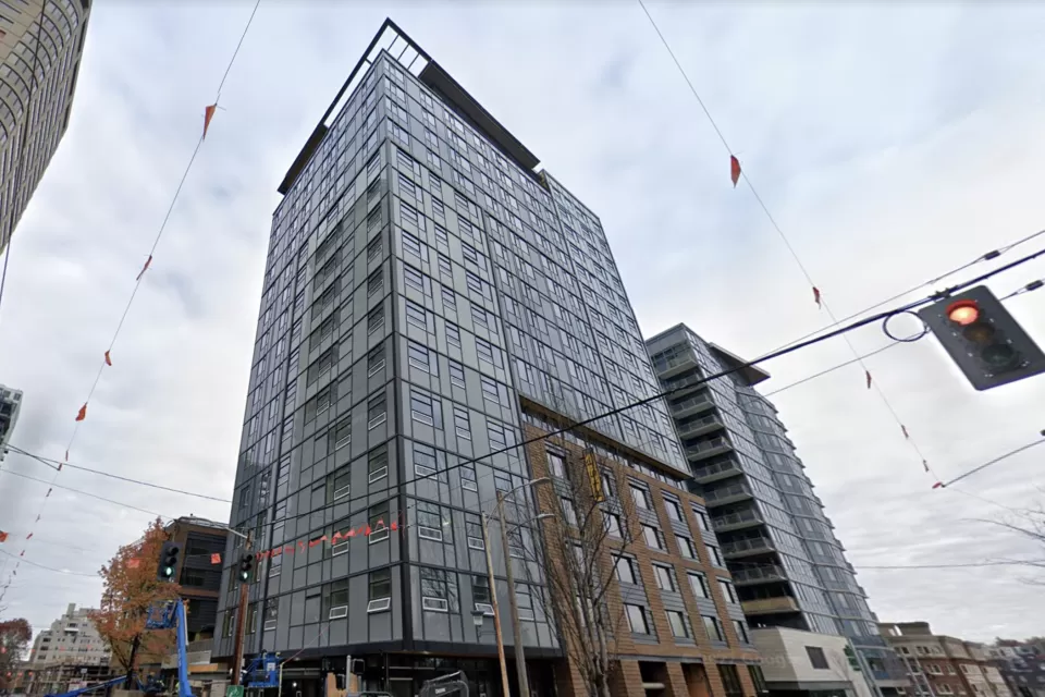 Google Street View looking up at The Rise on Madison high-rise apartment building under construction in Seattle, Washington.